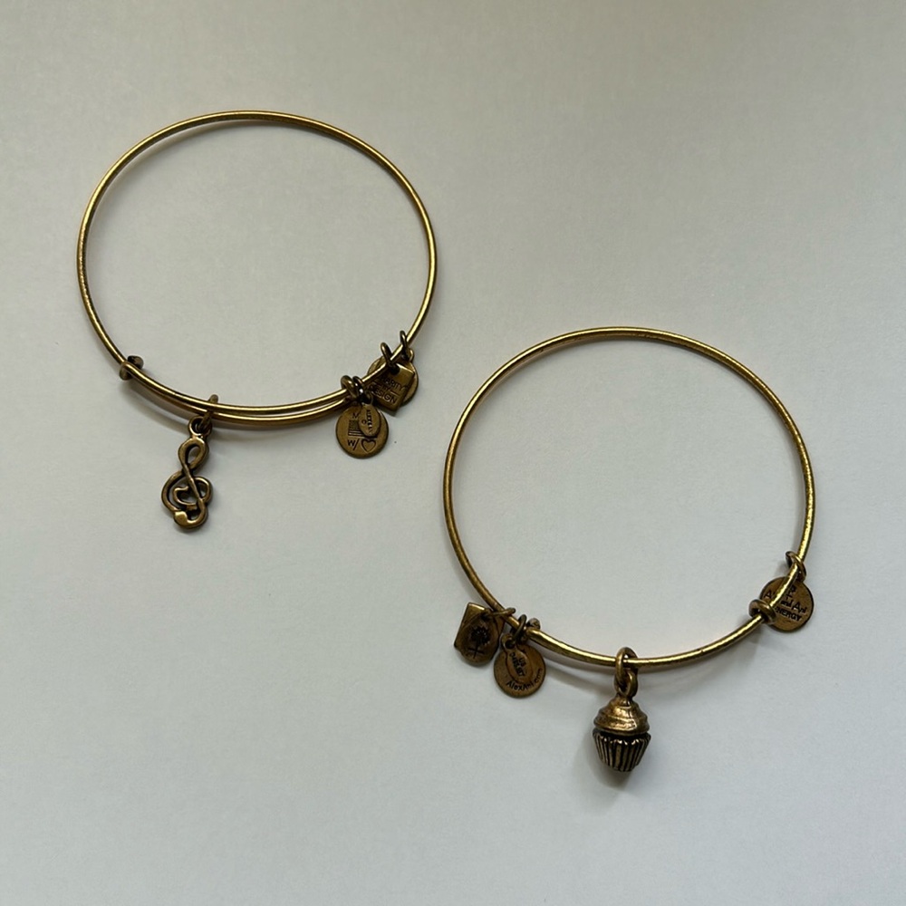 2 Alex and Ani bracelets in copper finish - music note and cupcake